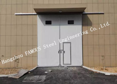 中国 研修会のためのアクセスの歩行者のドアが付いている部門別の横の滑走の産業ガレージのドア サプライヤー